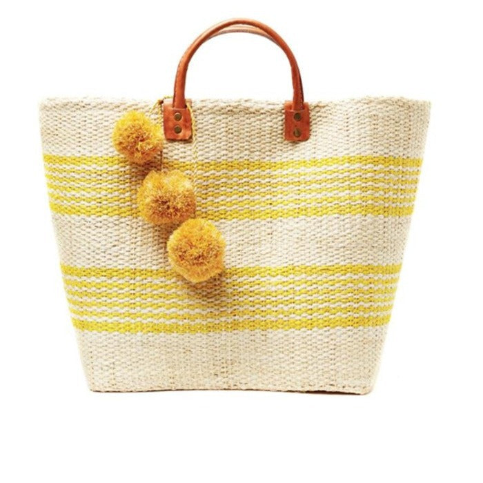 Stylish basket bag with playful pompons Kalsten
