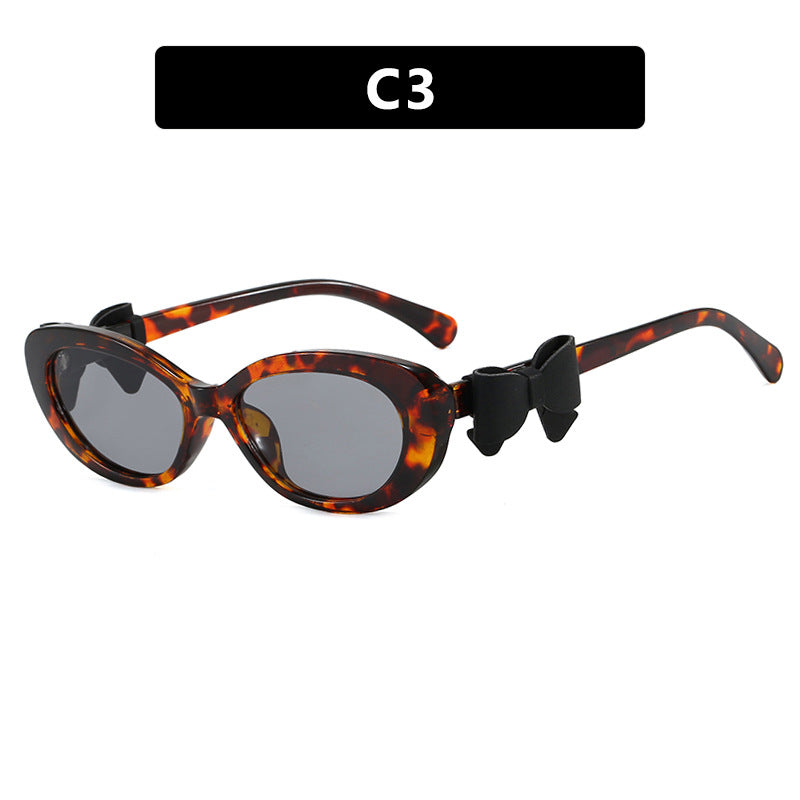 Women's fashionable sunglasses with playful bow design Kalsten