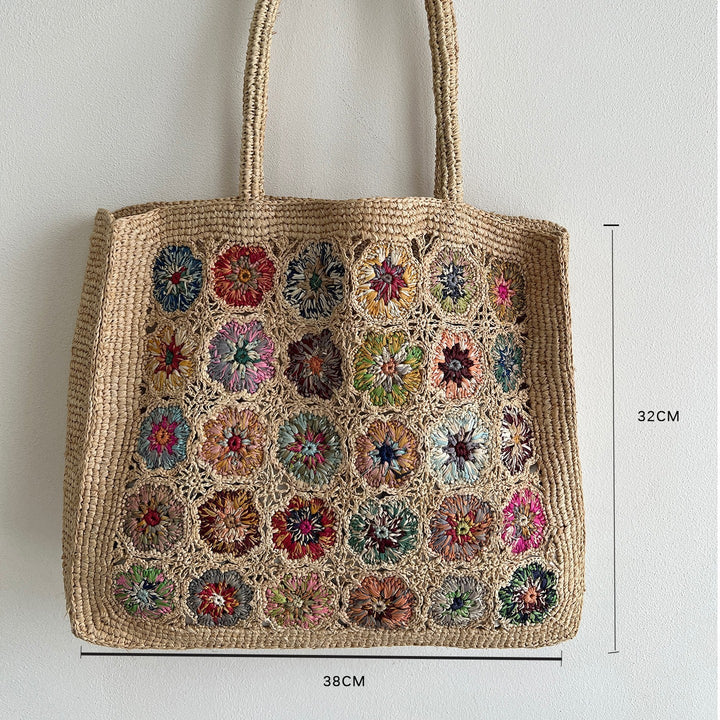 Braided shoulder bag with floral motif Kalsten