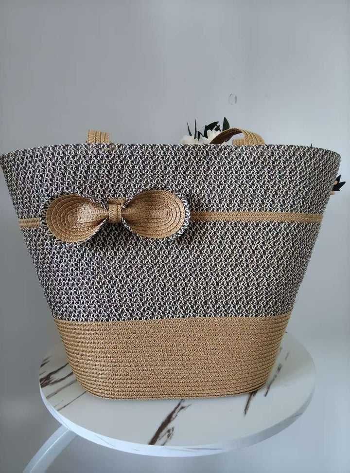 Elegant straw bag with decorative bow closure Kalsten