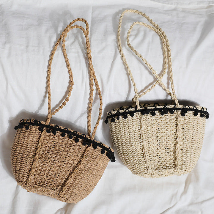 Delicate beach bag with pompons Kalsten