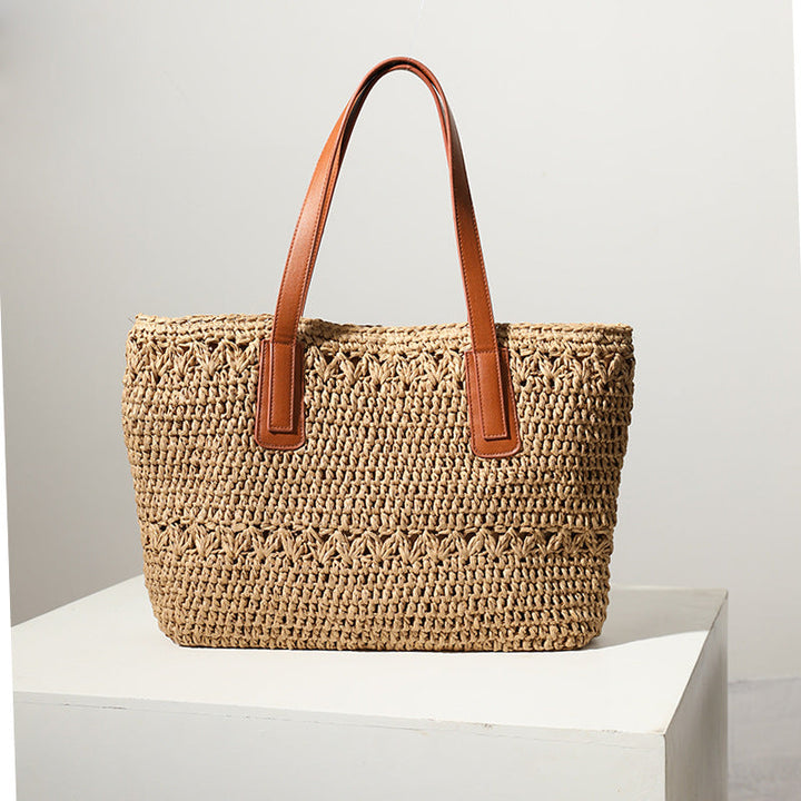 Braided straw bag with sturdy leather handles Kalsten