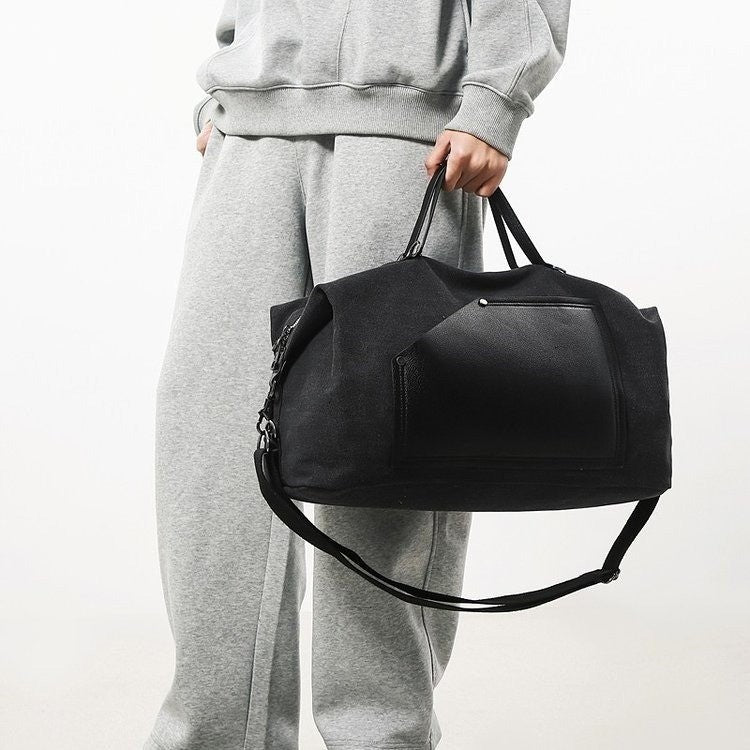 Sporty travel bag made of durable material with practical compartments Kalsten