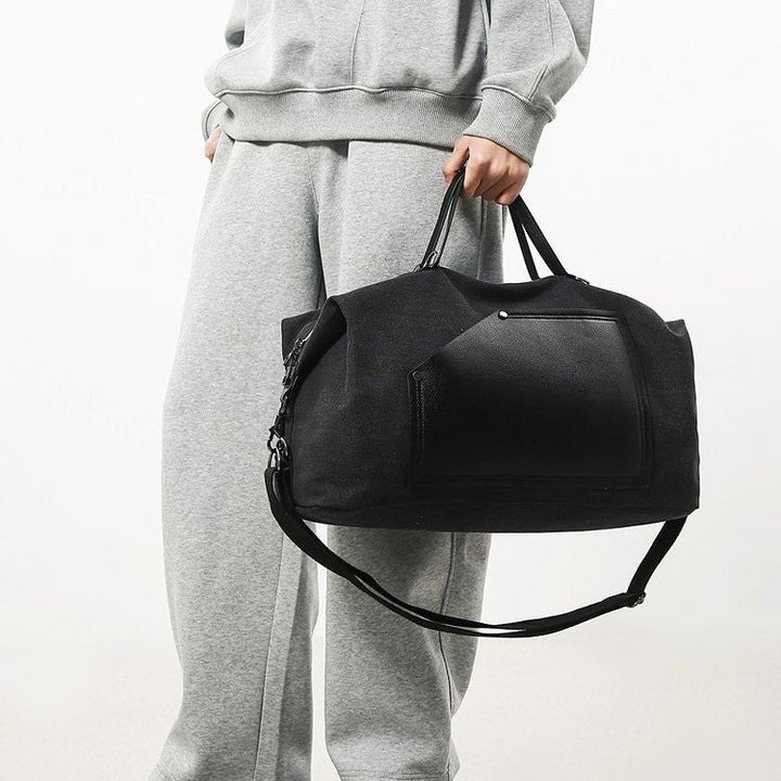 Sporty travel bag made of durable material with practical compartments Kalsten