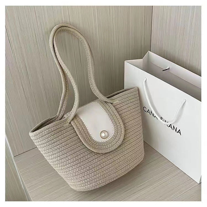 Fashionable basket bag with pearl clasp Kalsten