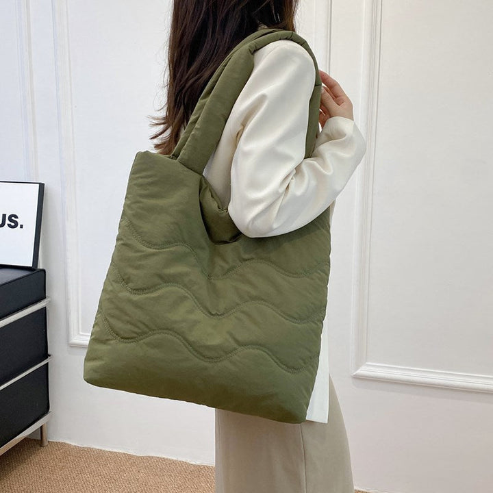 Padded shoulder bag with wave design Kalsten