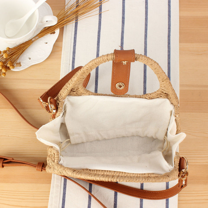Shoulder bag made of woven natural material with elegant leather accent Kalsten