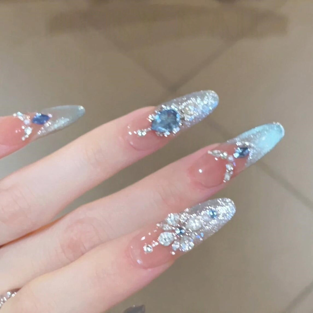 Glamorous artificial nails with sparkling rhinestone accents Kalsten