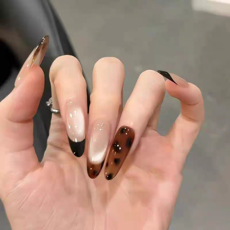 Artificial nails with elegant ombre effect and delicate rhinestone embellishments Kalsten