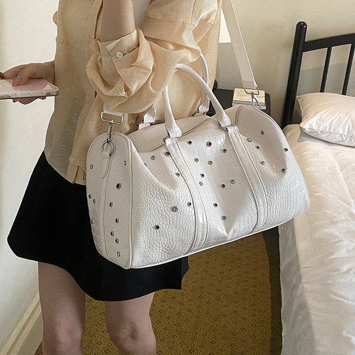 Fashionable travel bag with structured surface and versatile interior Kalsten