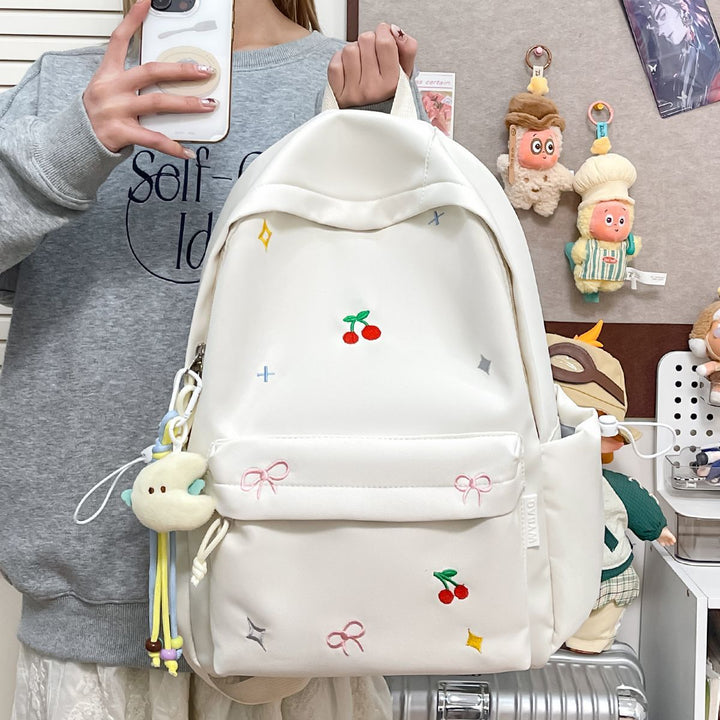 Playful backpack with embroidery Kalsten