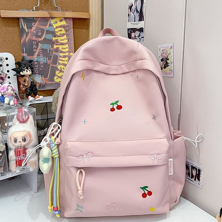 Playful backpack with embroidery Kalsten