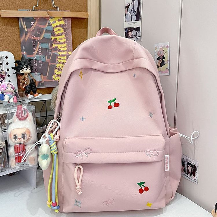 Playful backpack with embroidery Kalsten