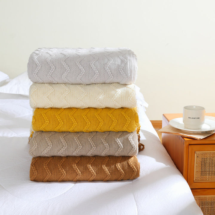 Women’s knitted blanket with textured wave pattern Kalsten
