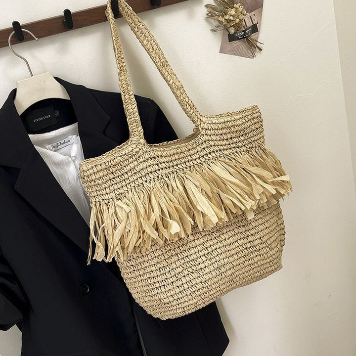 Charming Bast handbag with decorative fringes Kalsten
