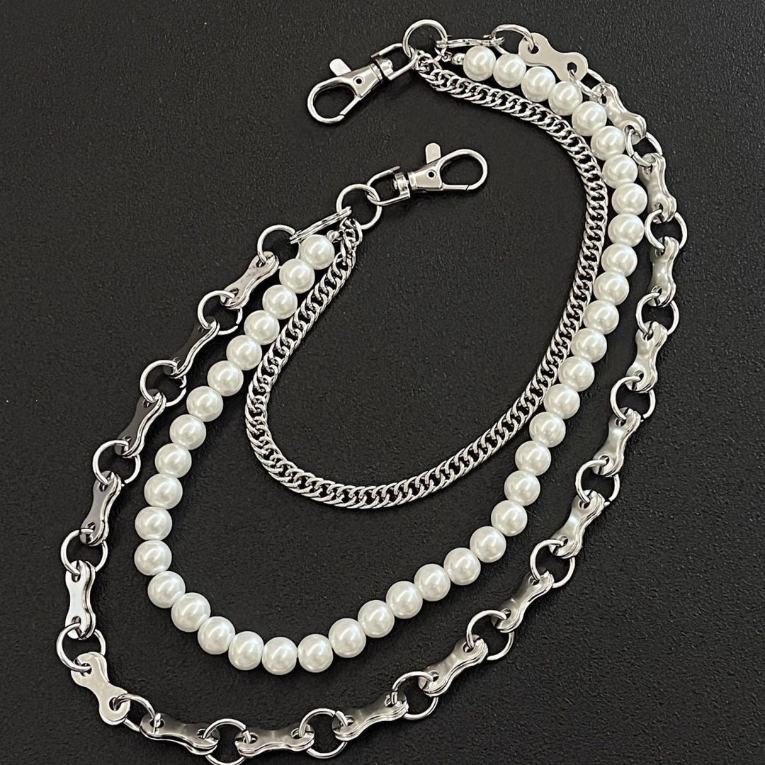 Fashionable chain bracelet with pearls and metal links Kalsten