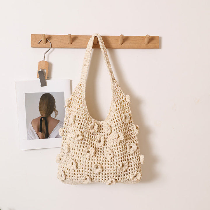 Hand-knotted shoulder bag with floral structural elements Kalsten