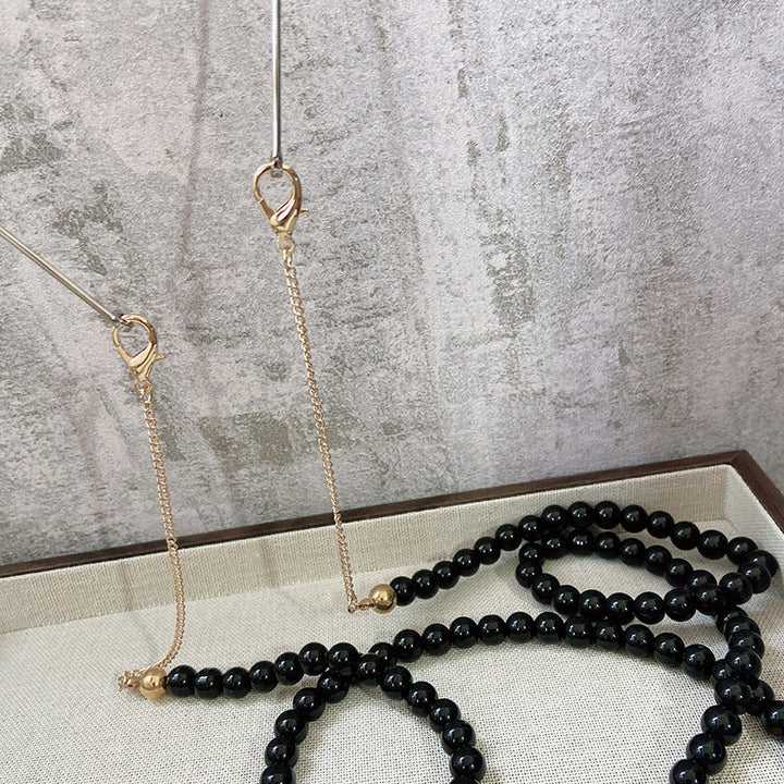 Fashionable jewelry band made of onyx beads Kalsten