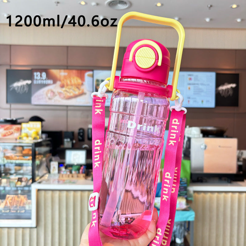 Women's large transparent drinking bottle with integrated carrying handle Kalsten