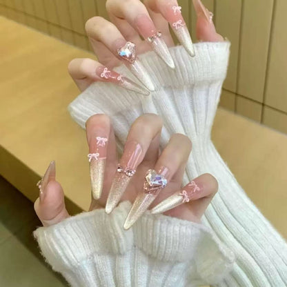 Acrylic nail set with elegant tips and glamorous rhinestone accents Acalora