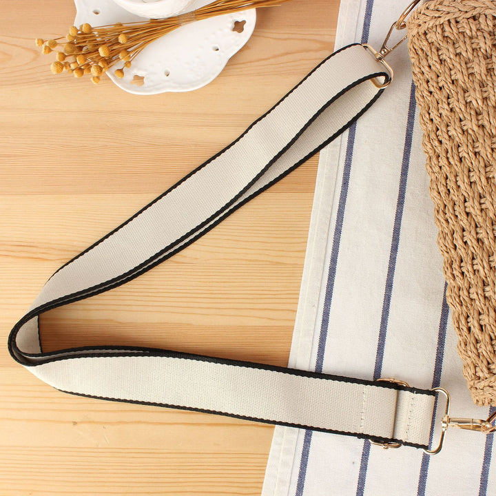 Handbag made of woven natural material with adjustable shoulder strap Kalsten