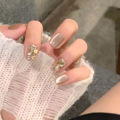 Acrylic nail set with glamorous gold details Acalora