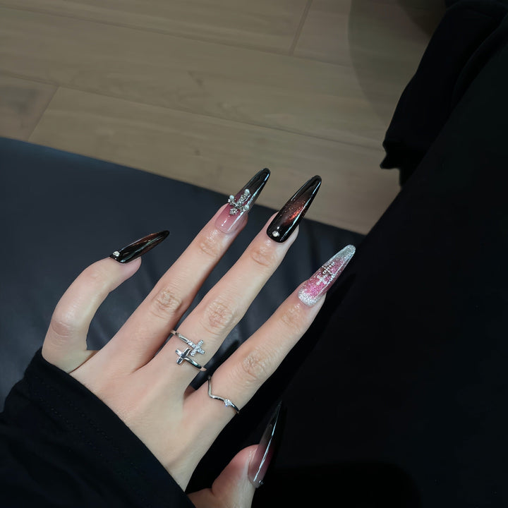 Glamorous artificial nails with shimmering color gradient and cross design Kalsten