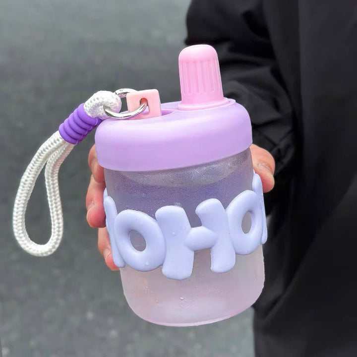 Women's funny and practical water bottle with integrated carrying strap Kalsten