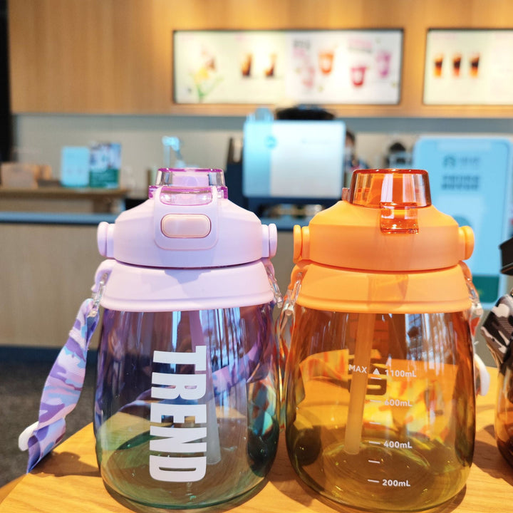 Women's multifunctional water bottle with safety closure and ergonomic carrying handle Kalsten