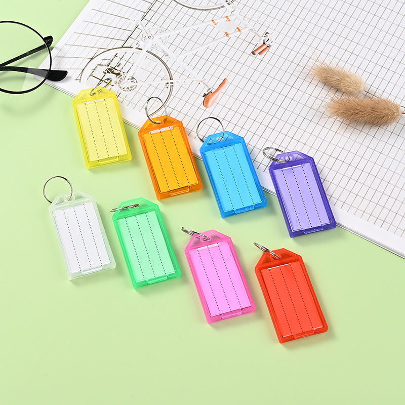 Unisex label tag with transparent sleeve and three writable fields Kalsten