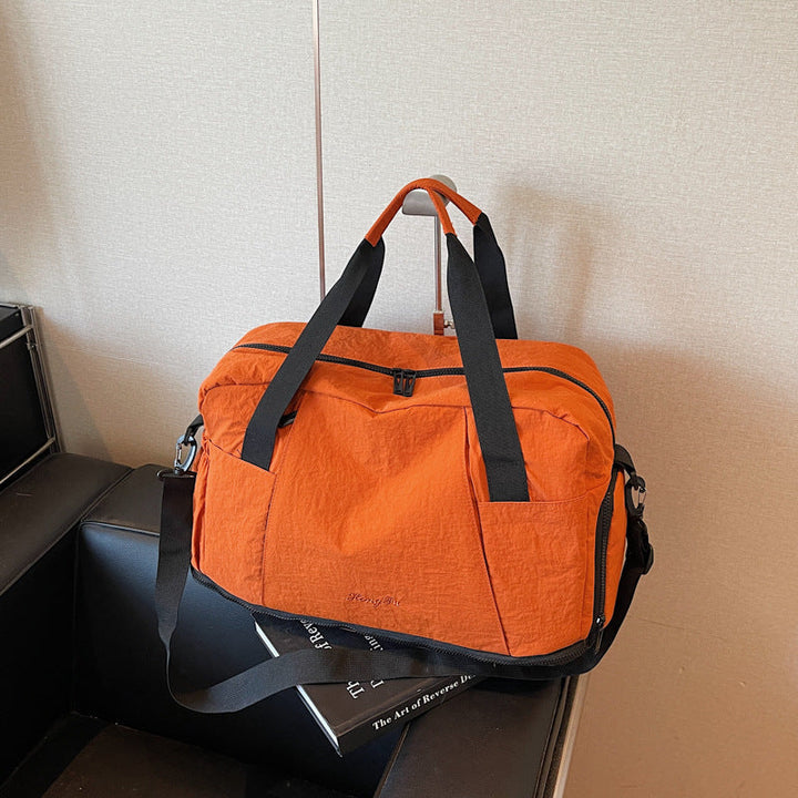Sporty travel bag with practical outer pockets Kalsten