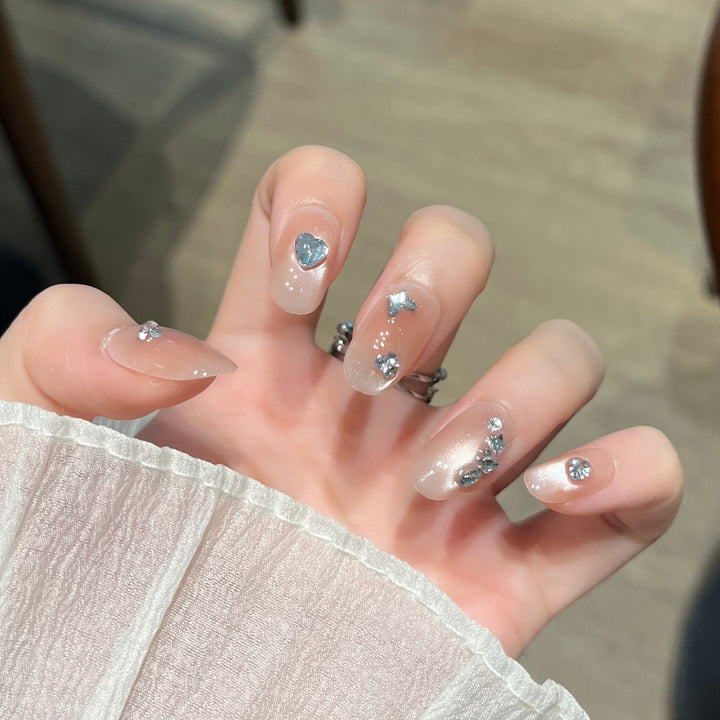 Elegant Nail Art Extensions with Pearl Accents Kalsten