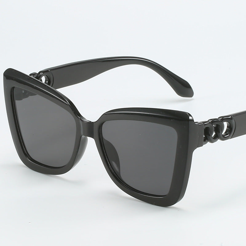 Ladies modern cat-eye sunglasses with clear frame and UV protection Kalsten