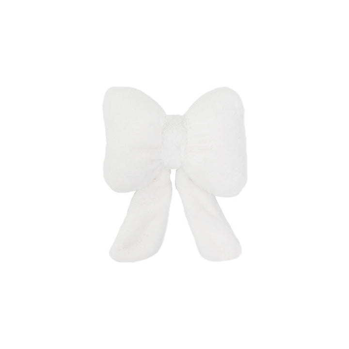 plush bow-shaped decorative throw cushion with long tails and faux-fur texture Kalsten