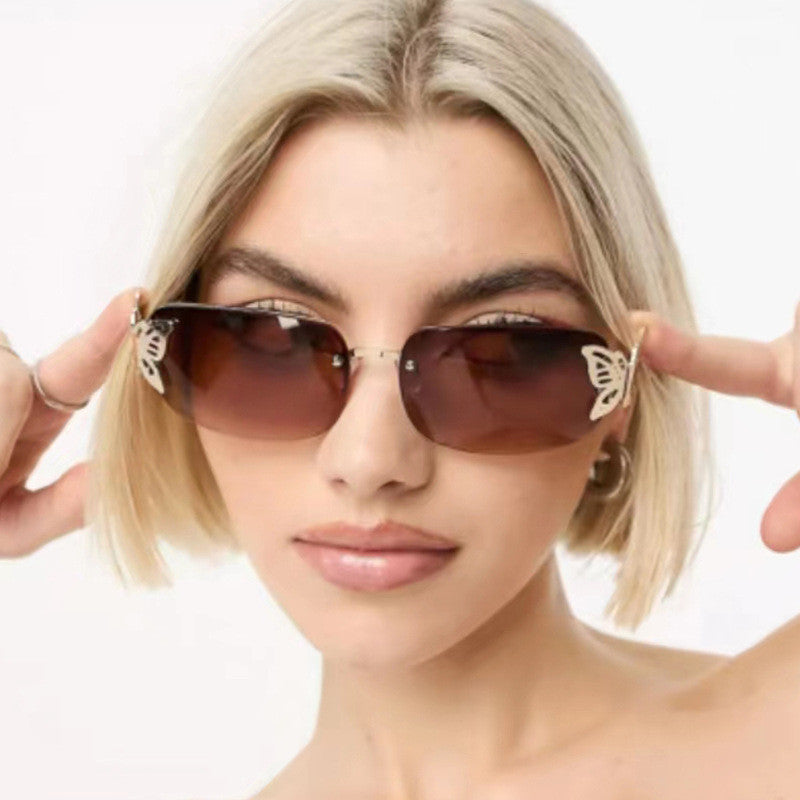 Ladies fashionable sunglasses with delicate butterfly design and protective lenses Kalsten