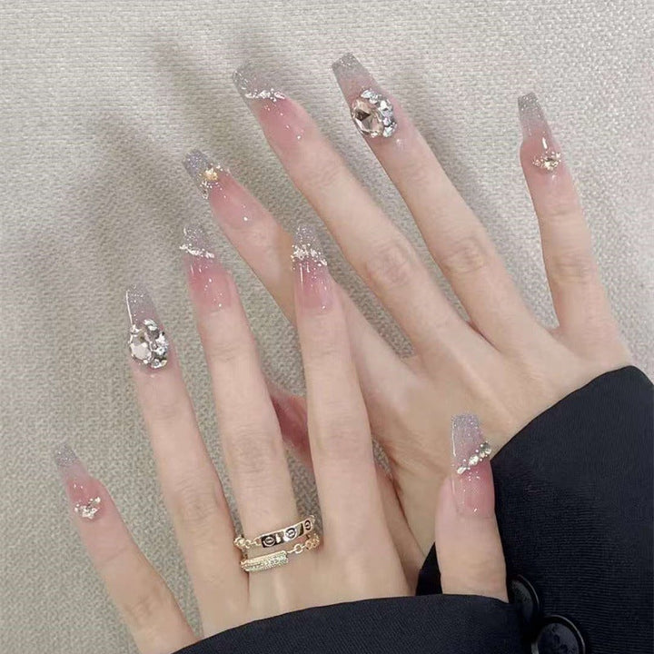 Elegant artificial nails with sparkling gold accents Kalsten