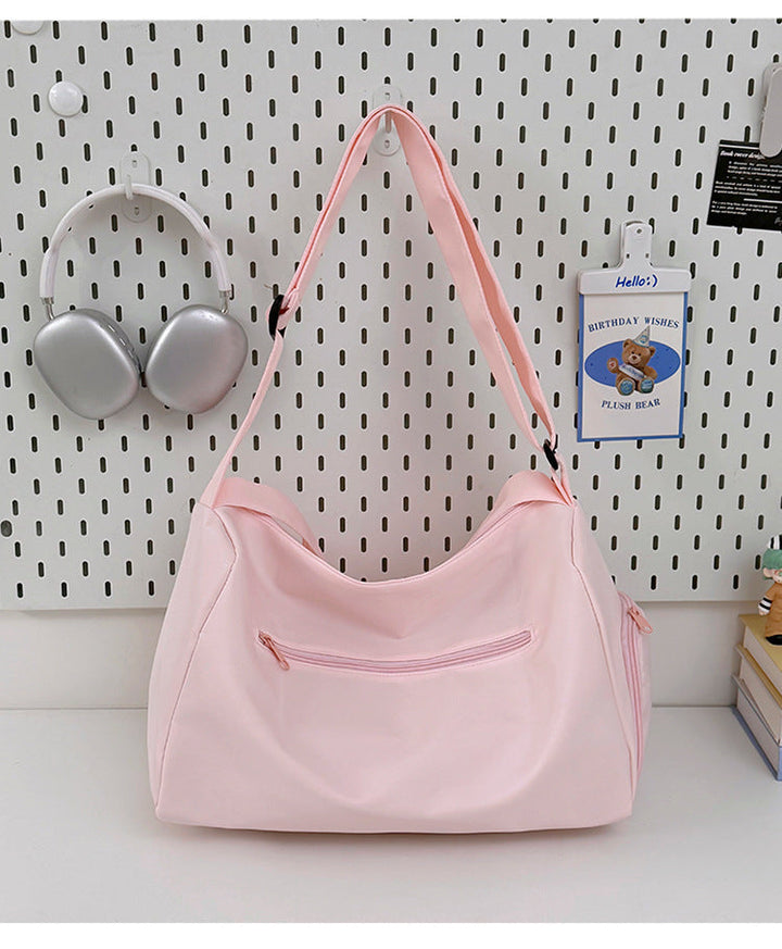 Sporty shoulder bag with spacious interior and sturdy carrying strap Kalsten