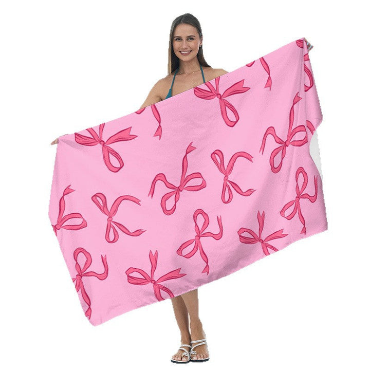 Beach towel with tropical leaf design Kalsten