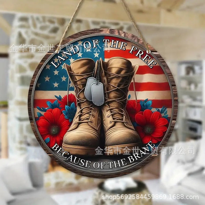 Independence Day rustic round wooden patriotic cross wall plaque with floral accents and God Bless America banner Kalsten