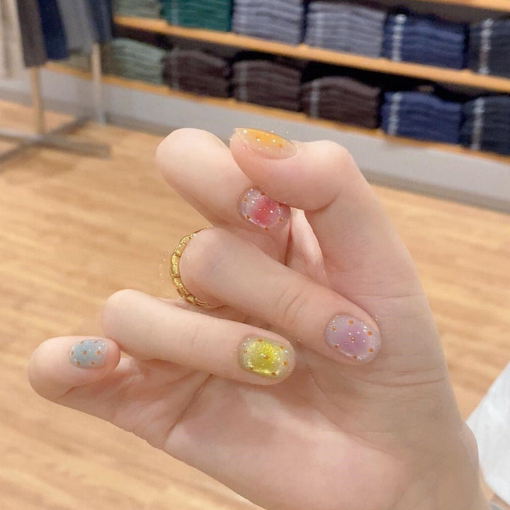 Glittering artificial nail tips in cheerful design Kalsten