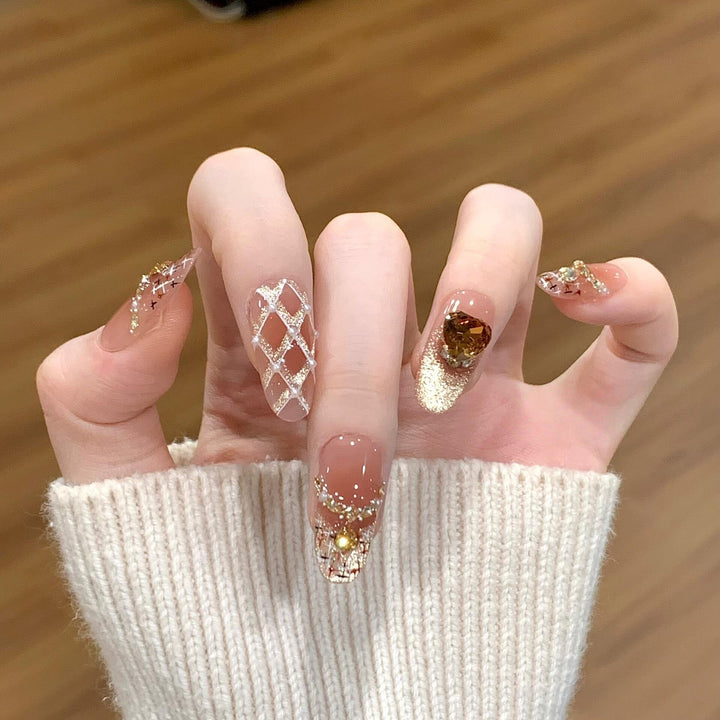 Glamorous artificial nails with glitter and heart design Kalsten