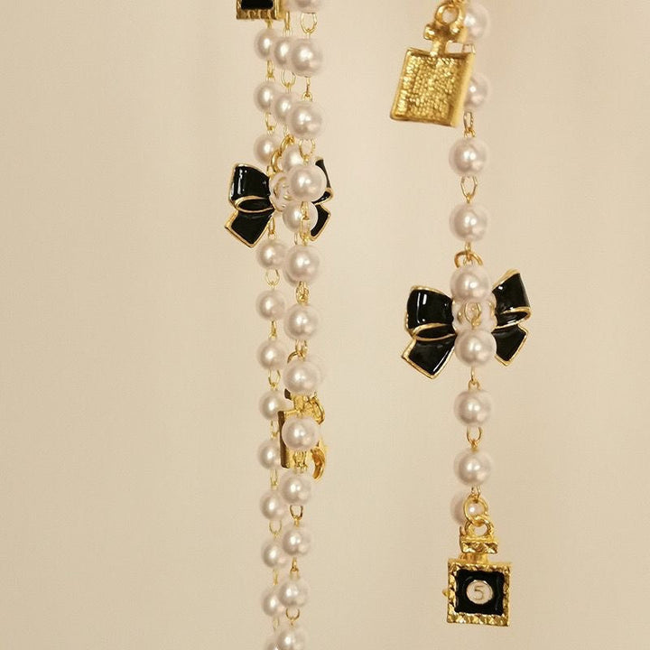 Fashionable glasses holder chain with pearls and pendants Kalsten