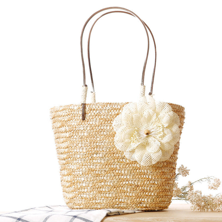 Elegant bast bag with flower appliqué Kalsten
