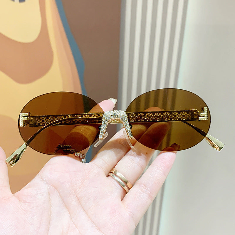 Women's sunglasses with glittering frame and oval lenses Kalsten