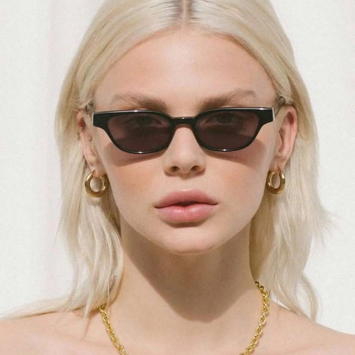 Women's fashionable sunglasses with curved frame and brown lenses Kalsten