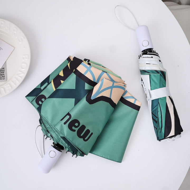 Ladies creative folding umbrella with graphic design Kalsten