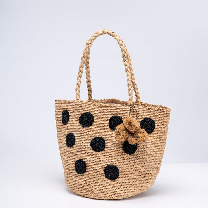 Handcrafted straw bag with eye-catching accents Kalsten