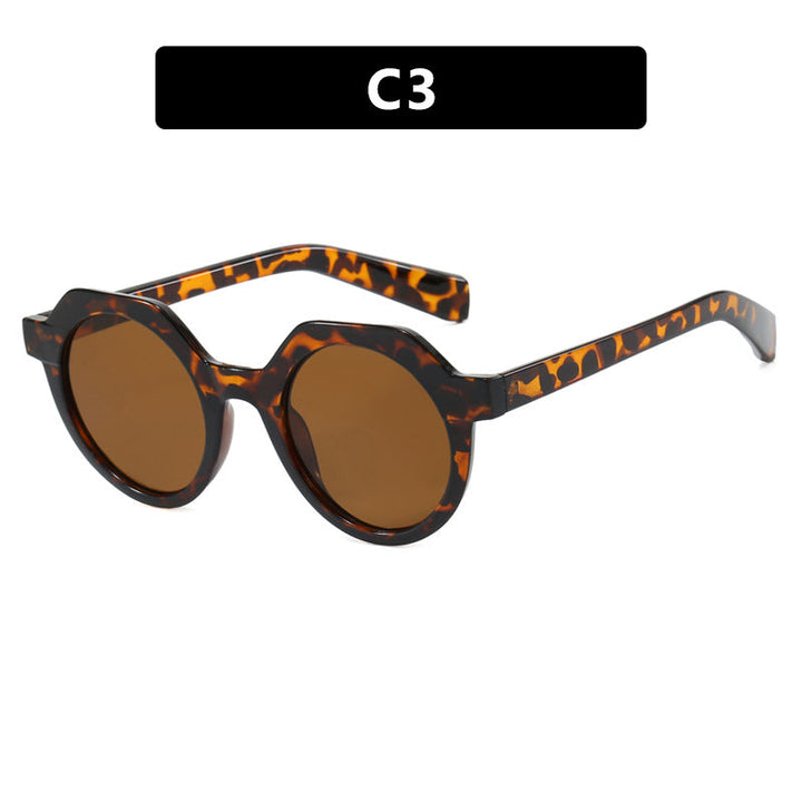 Ladies extravagant round sunglasses with colored accented frame Kalsten
