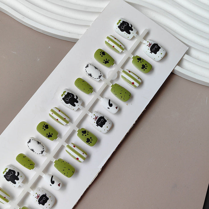Creative art press-on nails with playful animal design Kalsten
