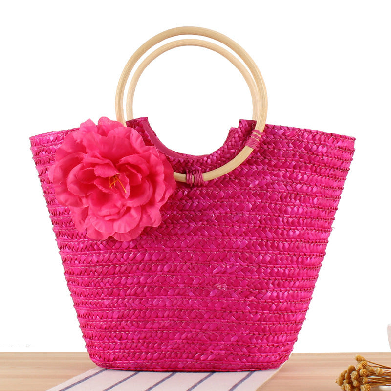 Braided straw bag with floral accent Kalsten